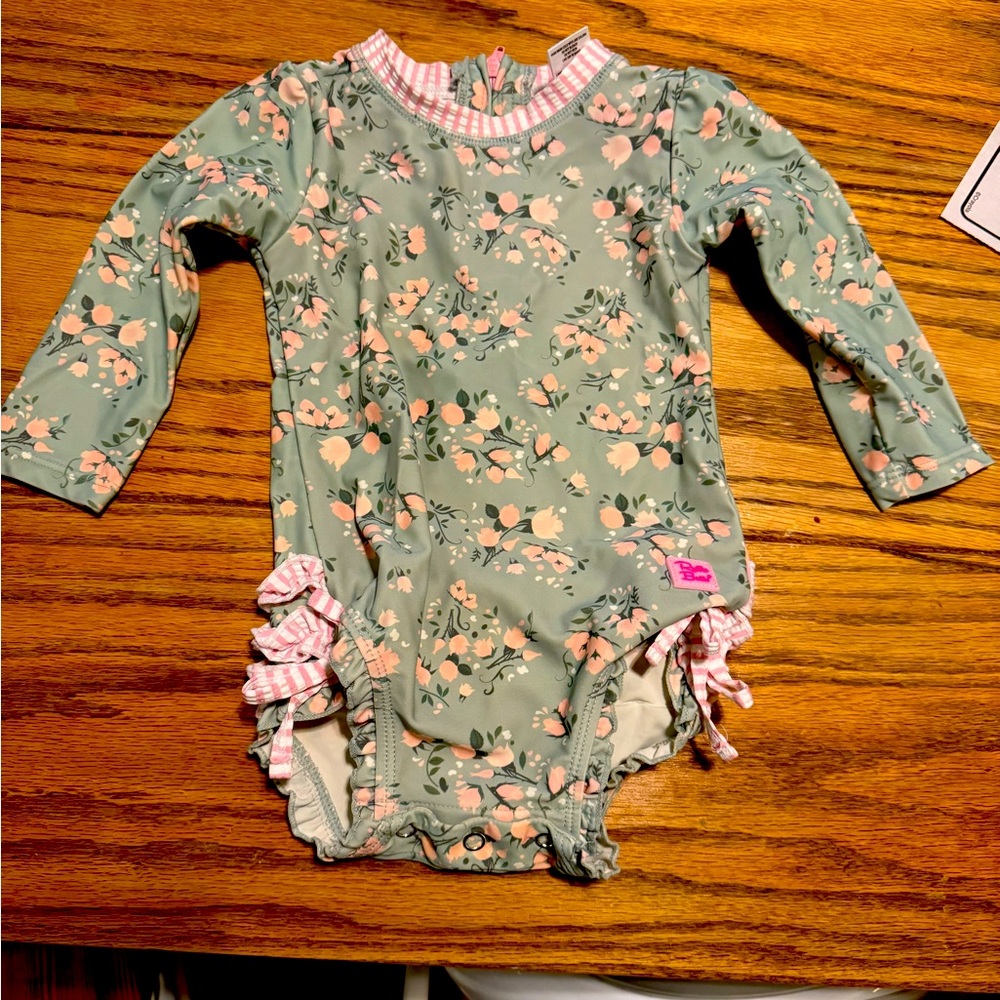 12-18 month girls ruffle butts swim suit.